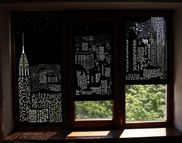 The HoleRoll Is A Perforated Blind That Shows A Cityscape
