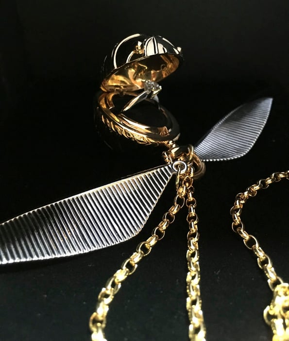 A Golden Snitch Engagement Ring Box For Harry Potter Lovers