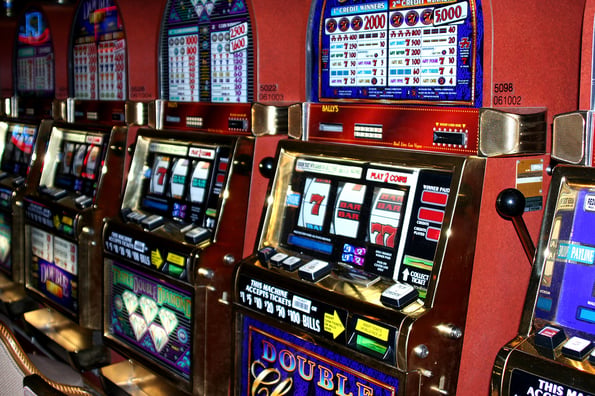 shooting down a row of slot machines