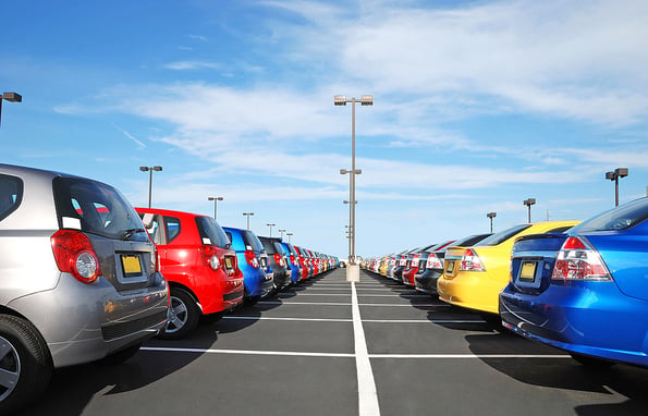 new cars in the parking lot in the automobile dealership