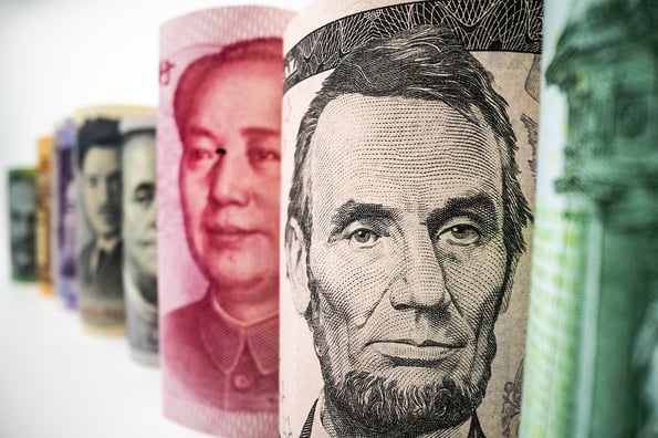 Macro shot of international currency money include US American Dollar, Euro Currency, Australian Dollar, China Yuan and Japan Yen. Foreign currency money exchange and Forex concept.