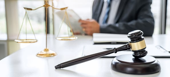 Judge gavel with Justice lawyers, Counselor in suit or lawyer working on a documents in courtroom, Legal law, advice and justice concept.