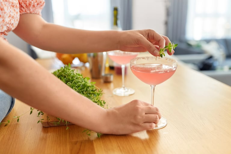 Preparing cocktails at home with fresh herbs