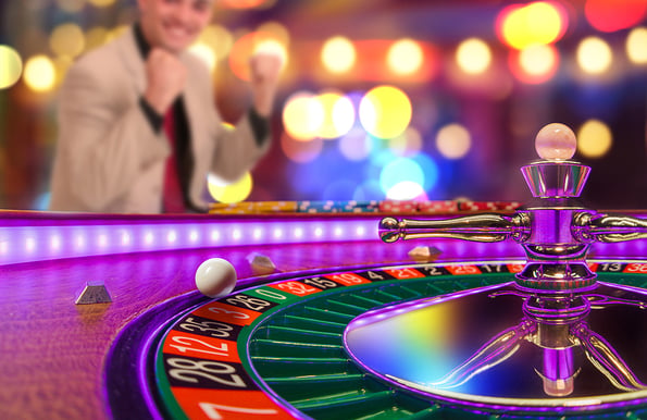 Man playing roulette at the casino - Shallow depth of field