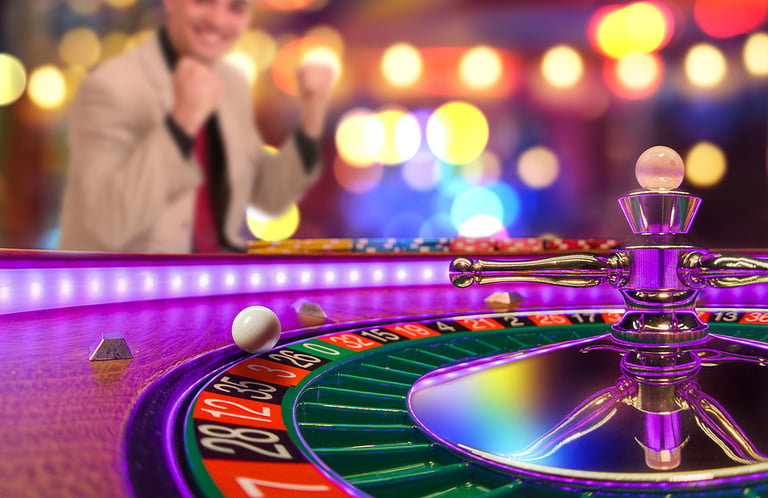 Man playing roulette at the casino - Shallow depth of field