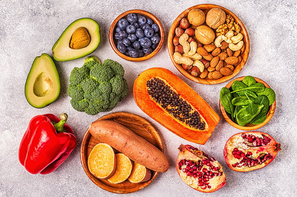 Anti-aging food - healthy fruits, vegetables, nuts. Top view.