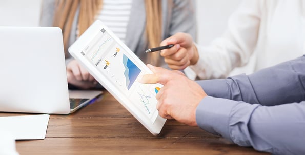 planning. Web marketing managers with gadgets working on paid search and SEO strategies, closeup of hands. SMM spesialists planning brand promotion budget, raising company awareness in social media