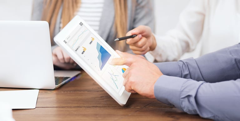 planning. Web marketing managers with gadgets working on paid search and SEO strategies, closeup of hands. SMM spesialists planning brand promotion budget, raising company awareness in social media