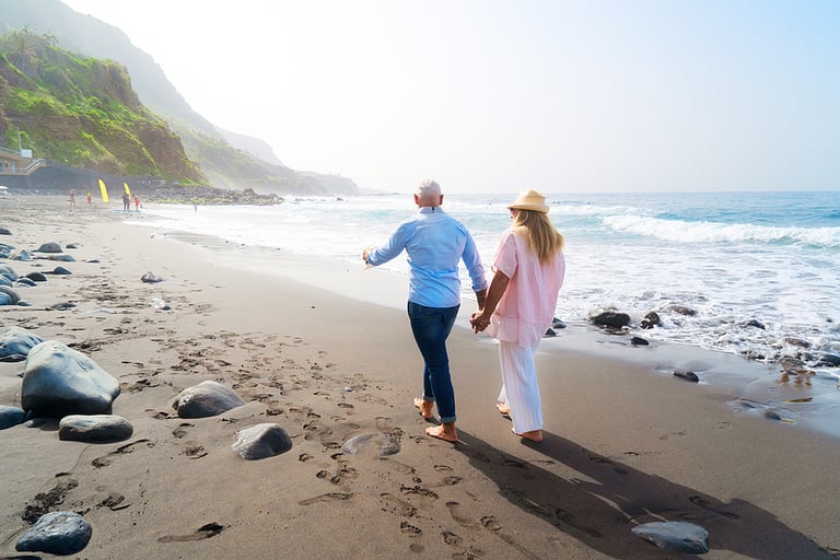 lifestyle with caucasian senior couple walking on beach, happy in love romantic and relax time, tourism of elderly family pleople, leisure and activity travel after retirement in vacations and summer