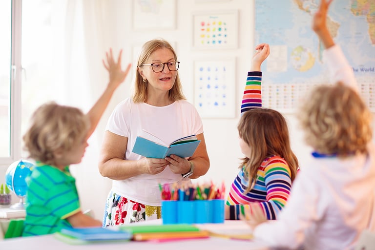 Kids in school. Preschool children in class. Happy kids back to school. Student in classroom. Child learning to read and write. Fun learning