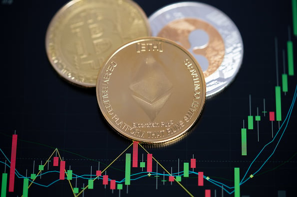 Focus select and blur Golden Ethereum ETH and bitcoin group cryptocurrency symbol and stock chart candlestick on tablets. Use technology cryptocurrency blockchain. with Capital Gain, Fundamental.