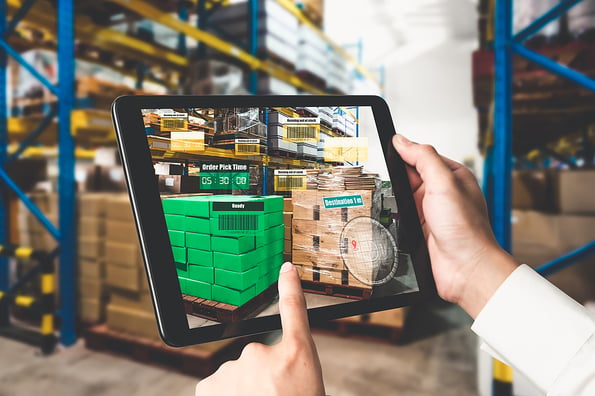 Smart warehouse management system using augmented reality technology to identify package picking and delivery . Future concept of supply chain and logistic business .