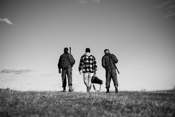 Hunting. Hunter with shotgun gun on hunt. Hunting Gear and Hunting Clothing.