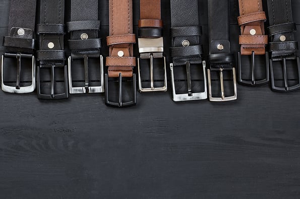 Genuine and Faux leather belts concept, Brown and black leather for denim, linen or corduroy trousers, stylish belt