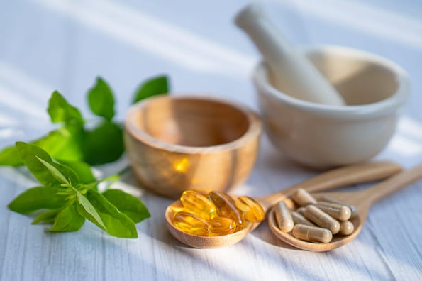 Alternative medicine herbal organic capsule with vitamin E omega 3 fish oil, mineral, drug with herbs leaf natural supplements for healthy good life.