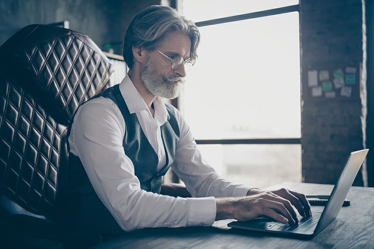 Close-up profile side view portrait of his he nice handsome confident focused serious gray-haired gentleman specialist writing finance data analysis at industrial loft style work place station