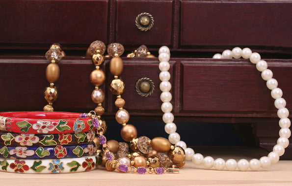 Vintage Jewelry and Open Jewelry Box on Table