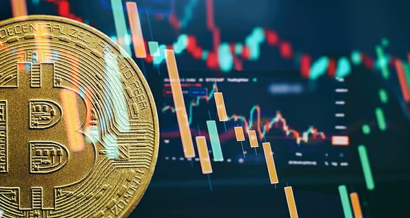 Bitcoin cryptocurrency gold coin. Trading on the cryptocurrency exchange. Gold Bitcoin crypto currency on background
