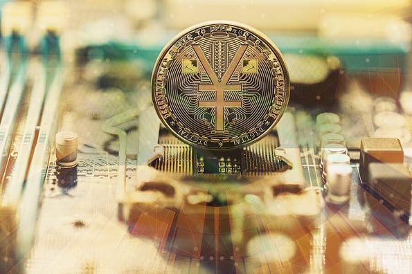 E-RMB gold coin, Chinese digital yuan, conceptual image of the digital version of the yuan. Chinese decentralized currency, on board and circuits