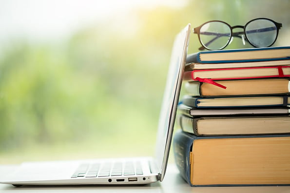 Object education green nature background with stack of ancient books or old bible, open paper book on wooden table with copy space. concept of back to school, research study