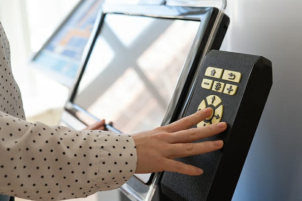 A woman uses a voting device for blind and visually impaired citizens.
