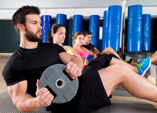 Abdominal plate training core group at gym fitness workout