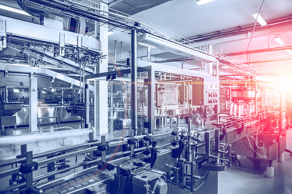Industrial factory equipment in blue color with red light, conveyor line and steel tools, industry background, toned