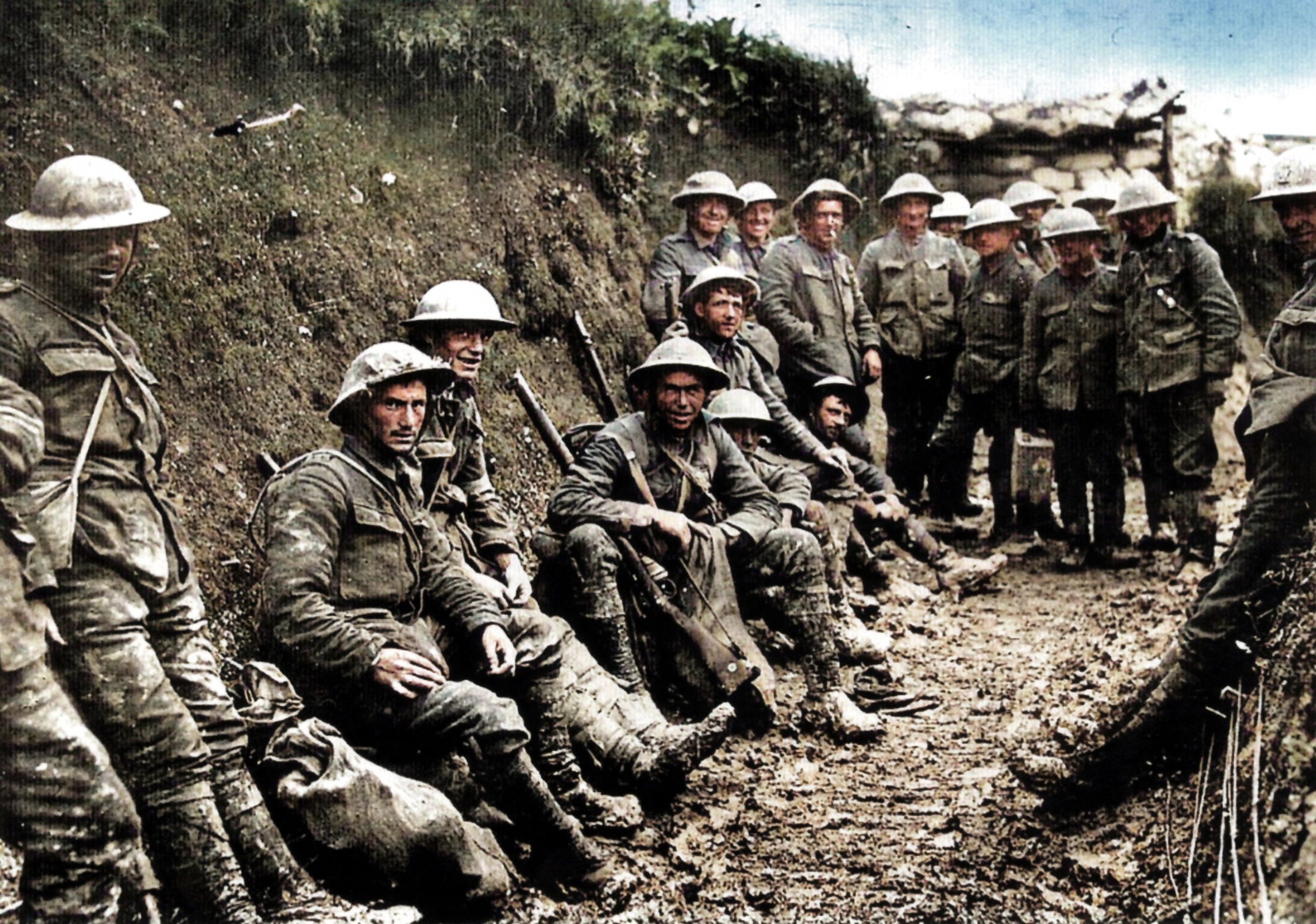 Somme, France,, 1 July 1916: Party of Royal Irish Rifles in a communication trench on the first day of the Battle. Soldiers during the war in Europe in the trenches look at the camera. Original photograph, more than 100 years old in black and white.