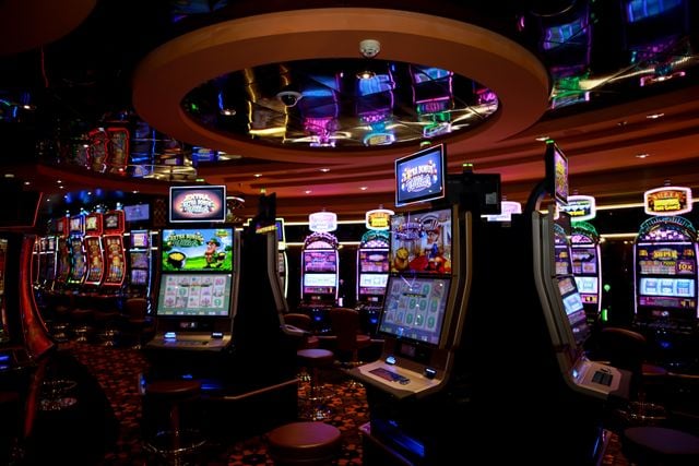 Colorful casino floor with slot machines and bright lights