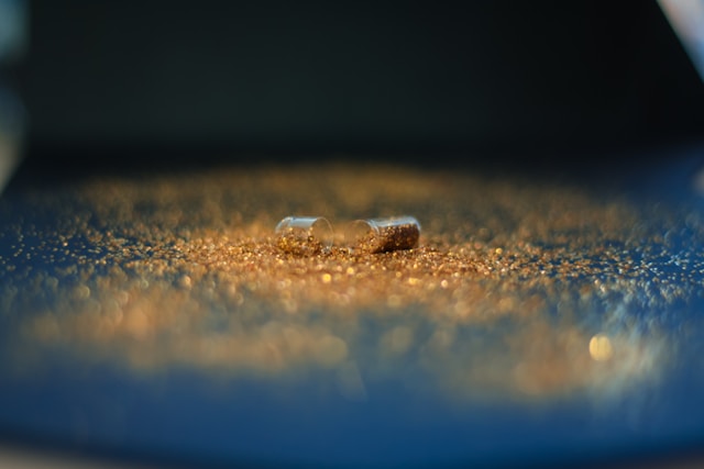 Glitter pill on a blue background