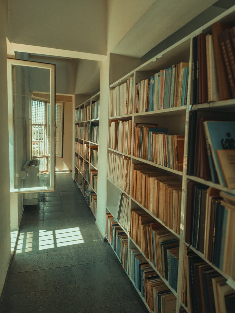 A hallway lined with a bookshelf