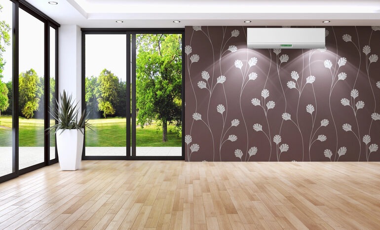 Bright room with large open windows promoting.