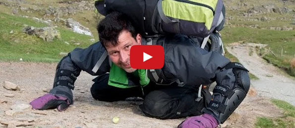 Man Pushing A Brussels Sprout Up A Hill With His Nose For Charity