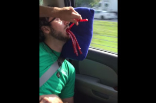 A Guy Passes Out So Naturally His Pals Stick Twizzlers In His Mouth