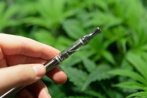 CBD vape oils. Weed Vape Pens for THC Oil . cannabis concentrates or CBD vape juice. simple electronic device.