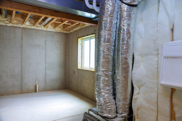 New home construction with installation of heating system in basement of house under remodeling