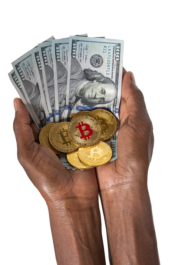 bitcoin African woman hands holding a stack of bitcoins and dollars,