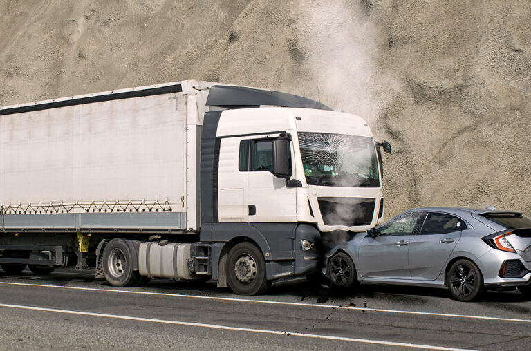 Speed and carelessness on the street. Accident between a truck and a car