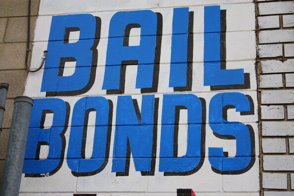 Bail Bonds sign near a jail in a storefront taken in Los Angeles, CA