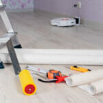 Close-up The Measuring Tape And The Wallpaper Smoothing Roller A