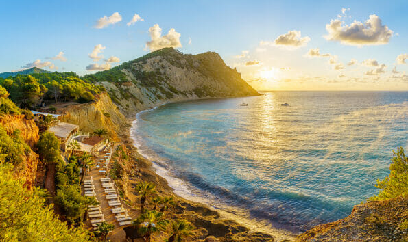 Landscape with Sol d'en Serra beach at sunrise time, Ibiza islands, Spain