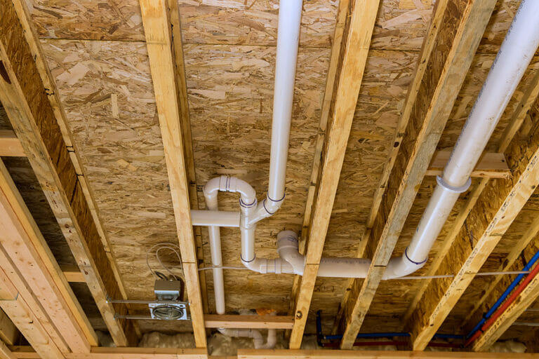 Under construction new bathtub house PVC waste water system rough plumbing bathroom drainage pipe and fitting complete