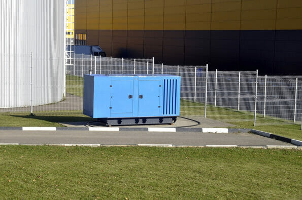 New blue mobile diesel generator for emergency power supply of the production complex. Energy.