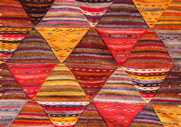 Texture of berber traditional wool carpet with geometric pattern, Morocco, Africa